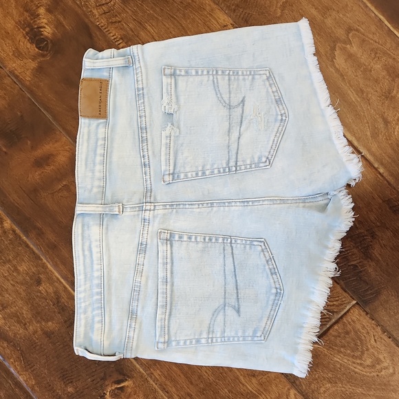 American Eagle Next Level Stretch High-Waisted Distressed Denim Shorts - Picture 2 of 11